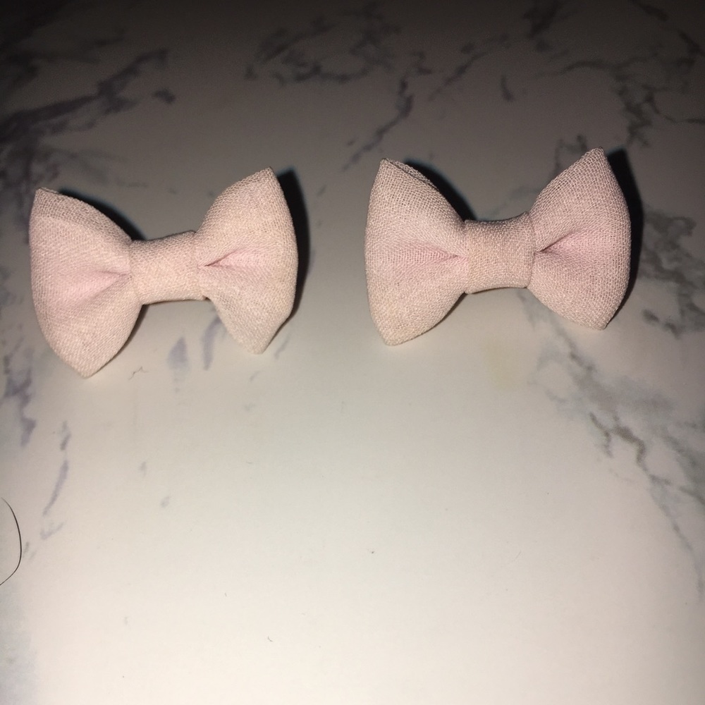Pink bow stud earrings
